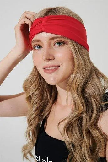 Vibrant amaranth red headband with intricate design, perfect for adding a pop of color.